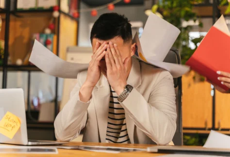 Employee practicing mindfulness at workplace Work stress management and burnout prevention Team leader supporting employee wellbeing