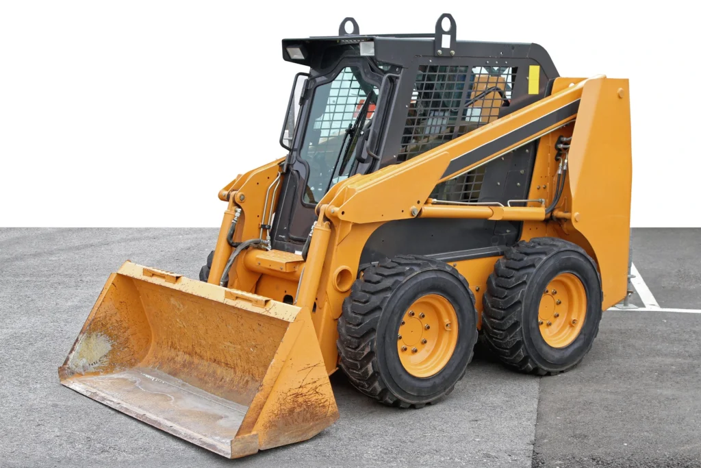Operator practicing safe skid loader handling techniques